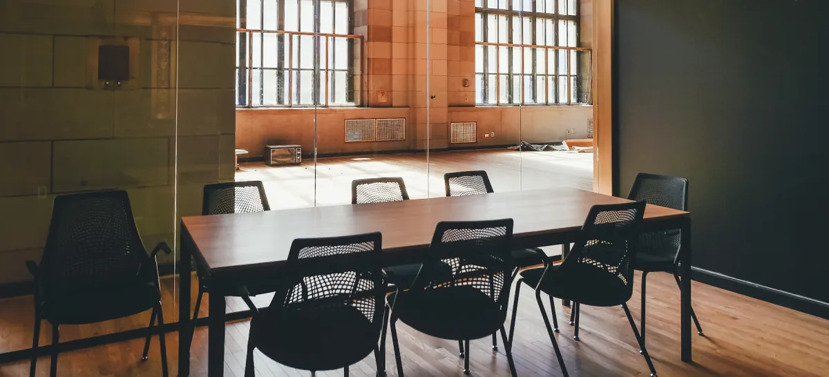 A boardroom prepared for collaborative leadership work